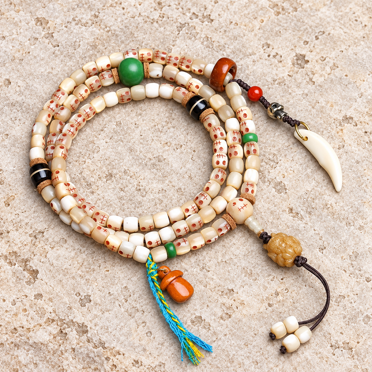 EverestArtstudios Carved Fish Bone 108-Bead Mala with Colorful Accents and Curved Pendant — overall display