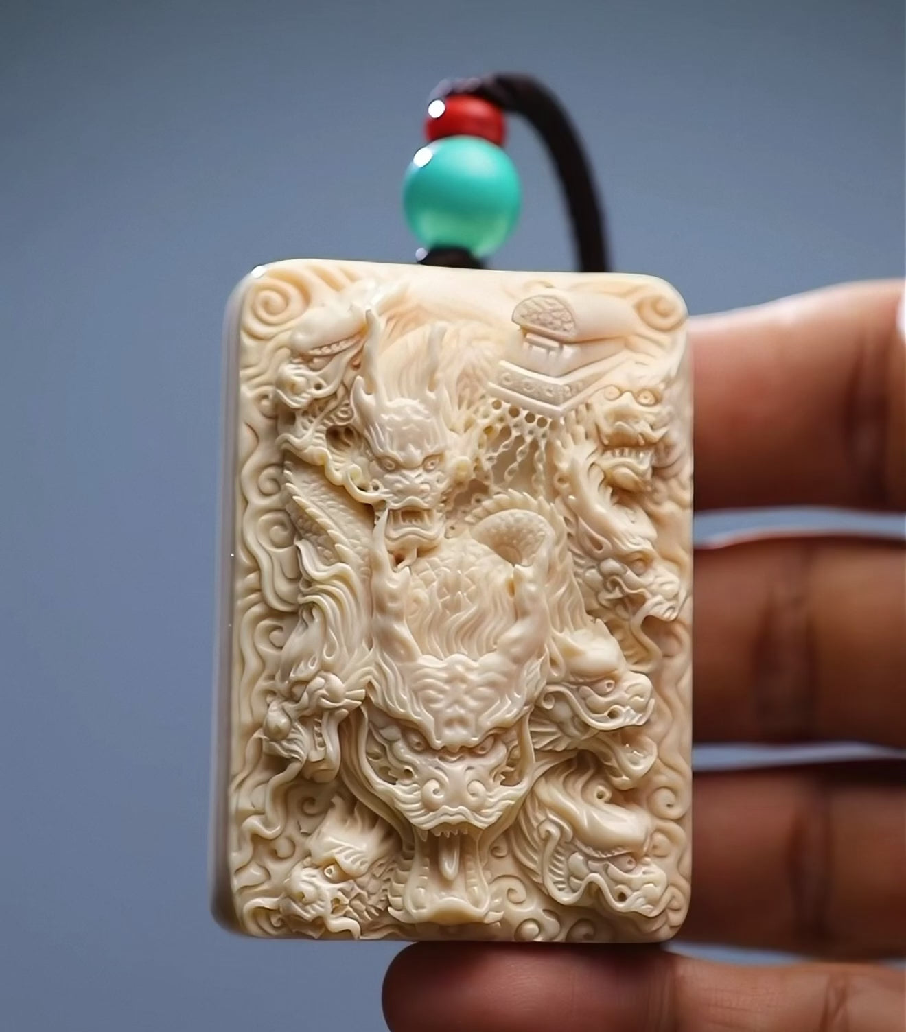 Load video: EverestArtStudios Natural Reclaimed Mammoth Ivory Nine Dragons Pendant, Hand Carved Dragon Amulet Necklace, Fortune Talisman Gift