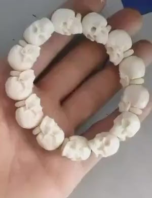 Load video: Handcrafted Tibetan Skull Mala Bracelet Camel Bone Amulet Beads