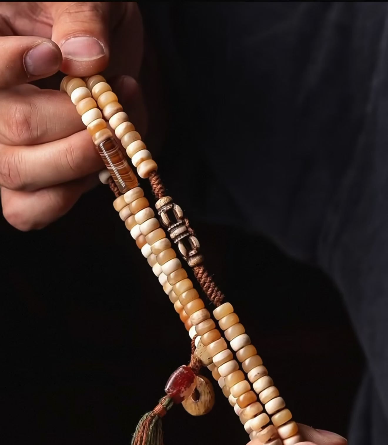 Load video: EverestArtStudios Original Tibetan-Inspired Horse Bone Mala Bracelet – Designer Meditation Beads | Handcrafted Bone Wrist Mala | Collectible Tibetan Style Bracelet
