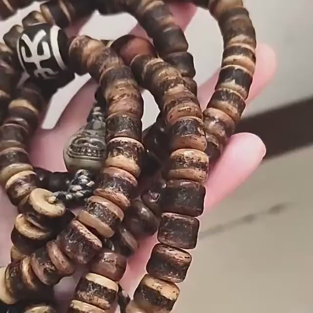 Load video: Handcrafted Yak Bone Mala Bracelet: Tibetan Prayer Beads, Spiritual Jewelry