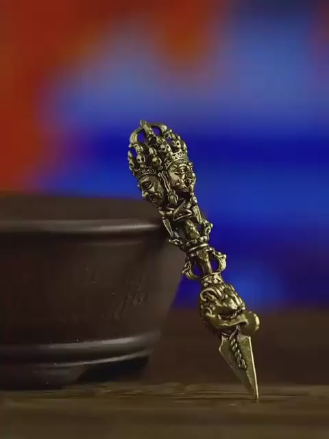Load video: Nepalese Copper Three Faced Phurba Pendant, Handcrafted Ucchusma Kila Dagger Amulet, Sacred Tibetan Buddhist Protection Necklace Jewelry