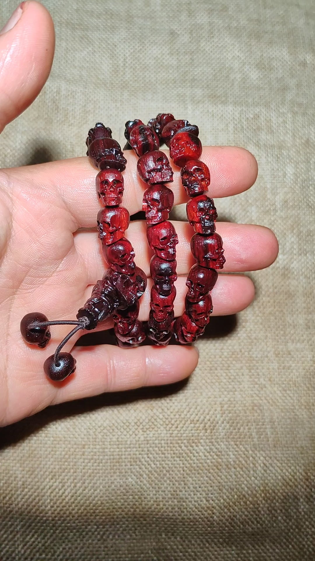 Load video: Natural Red Sandalwood Skull Mala Bracelet: Tibetan Buddhist Prayer Beads