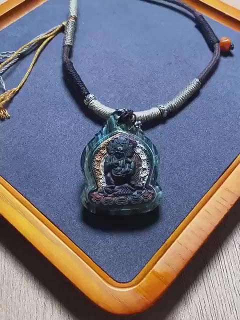 Load video: Handmade Black Jambhala Tsa Tsa Necklace, Tibetan Buddhist Gau Box Pendant, Miniature Thangka Amulet, Wealth &amp; Prosperity Protector Gift